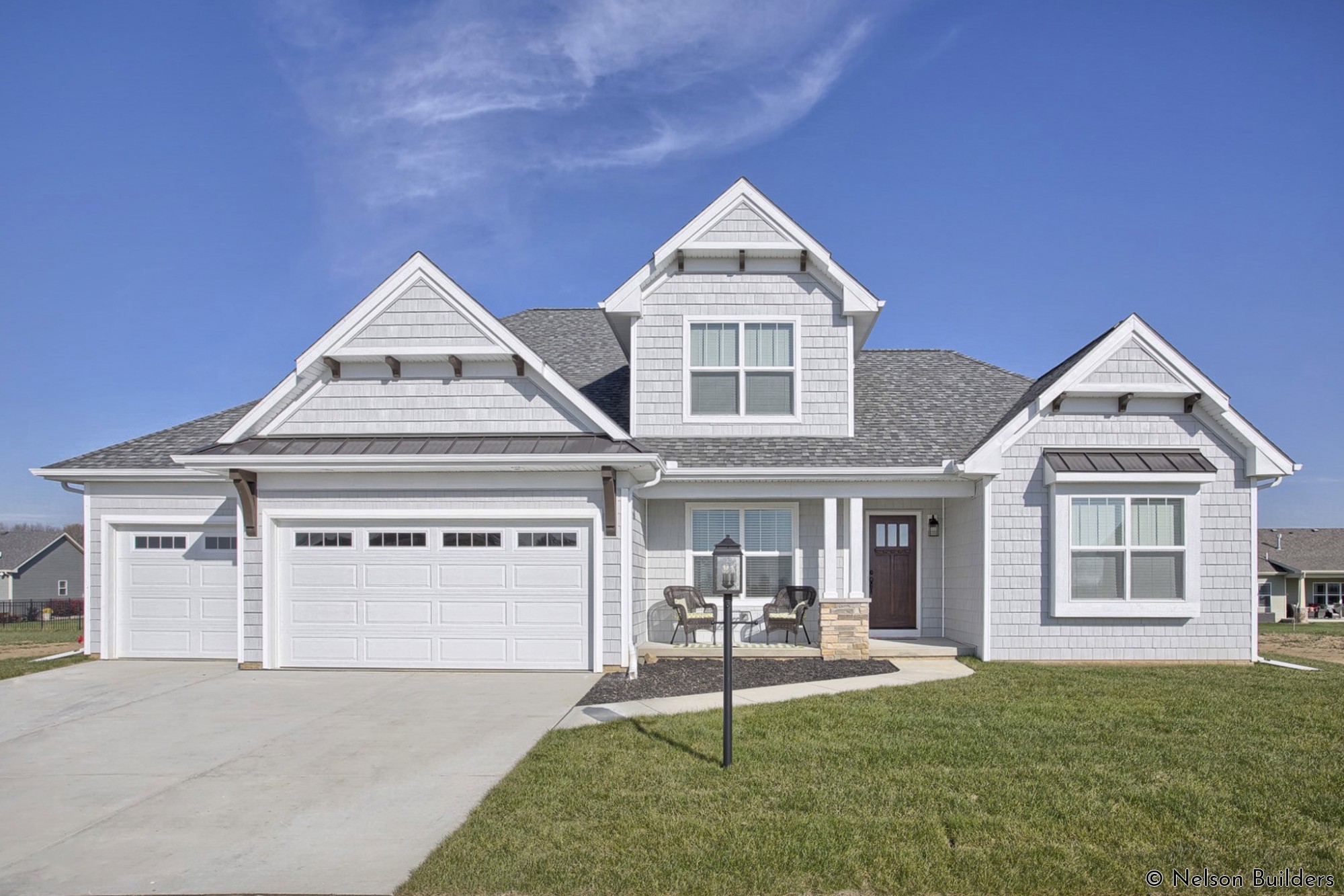 The beautiful exterior of a new Cherrydale plan in Whisper Meadow.