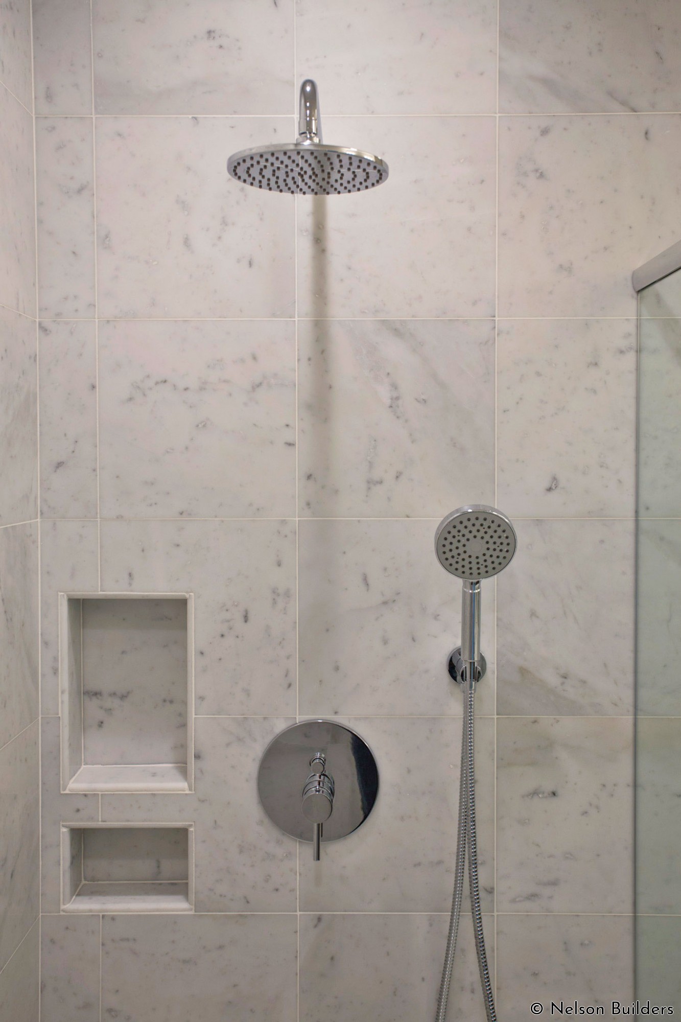 The spa-like master shower of this new Cherrydale home by Nelson Builders.