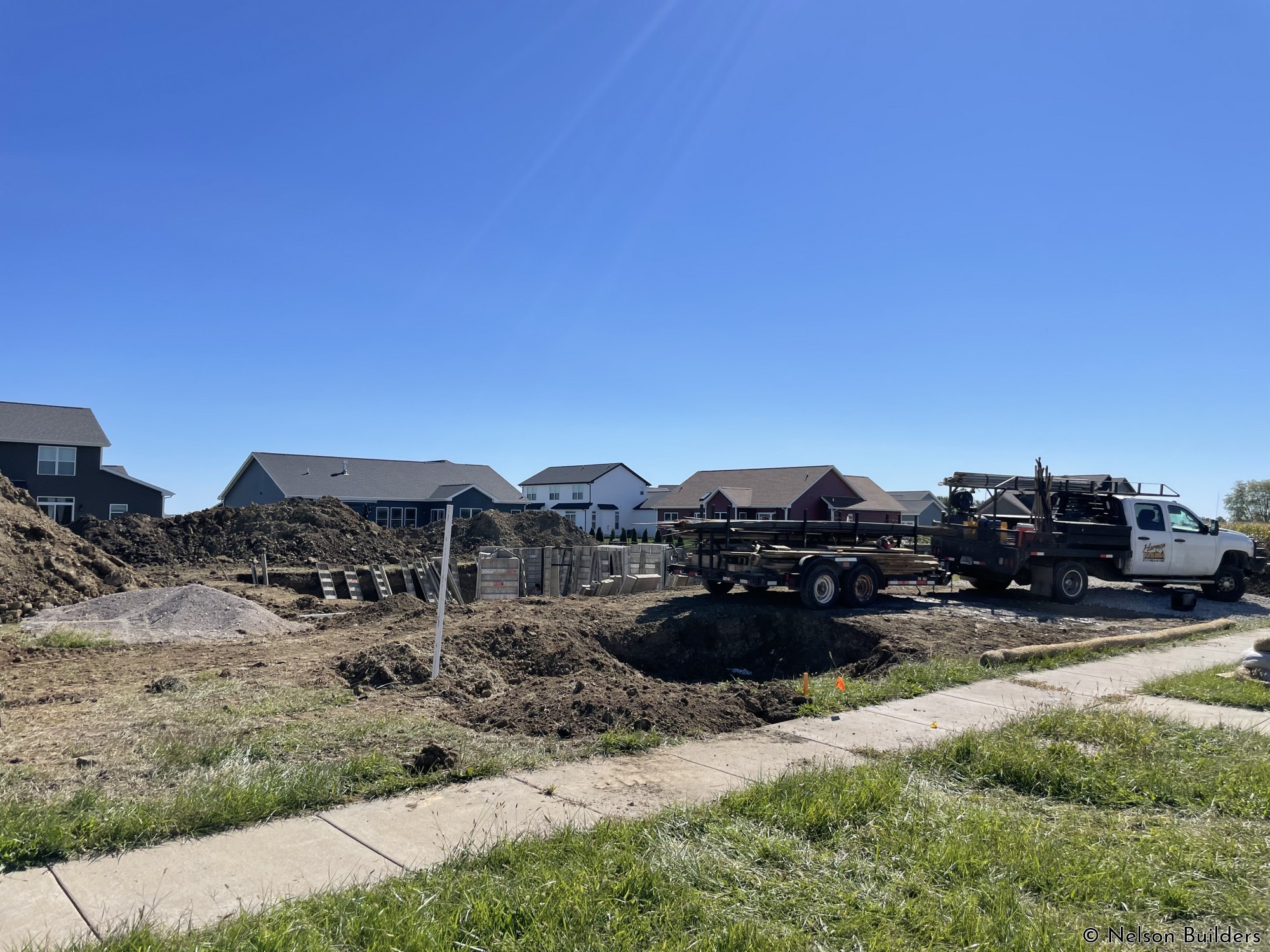 Footings are poured, starting to set basement wall forms.