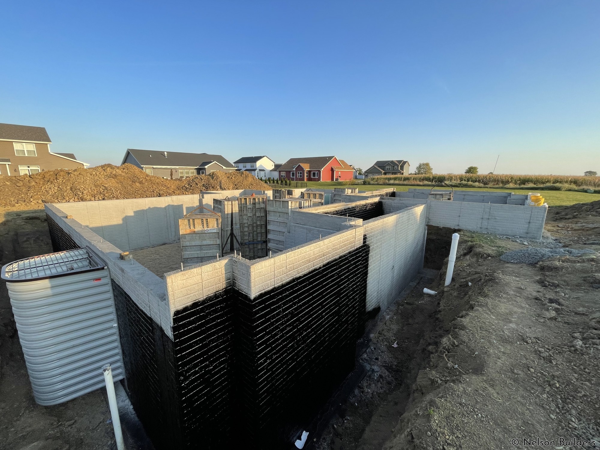 Forms have been removed and waterproofing applied.